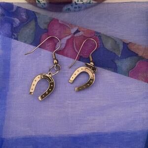 Silver horse show dangly earrings